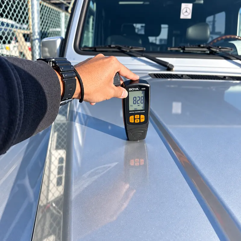 Paint thickness measurement during a physical vehicle inspection in Japan